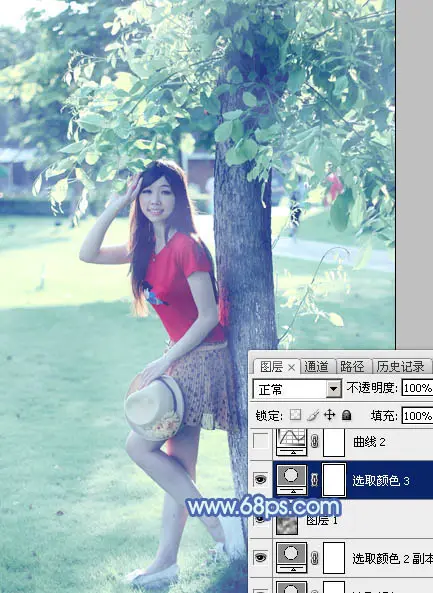 Photoshop为树边的女孩增加流行的淡调青蓝色